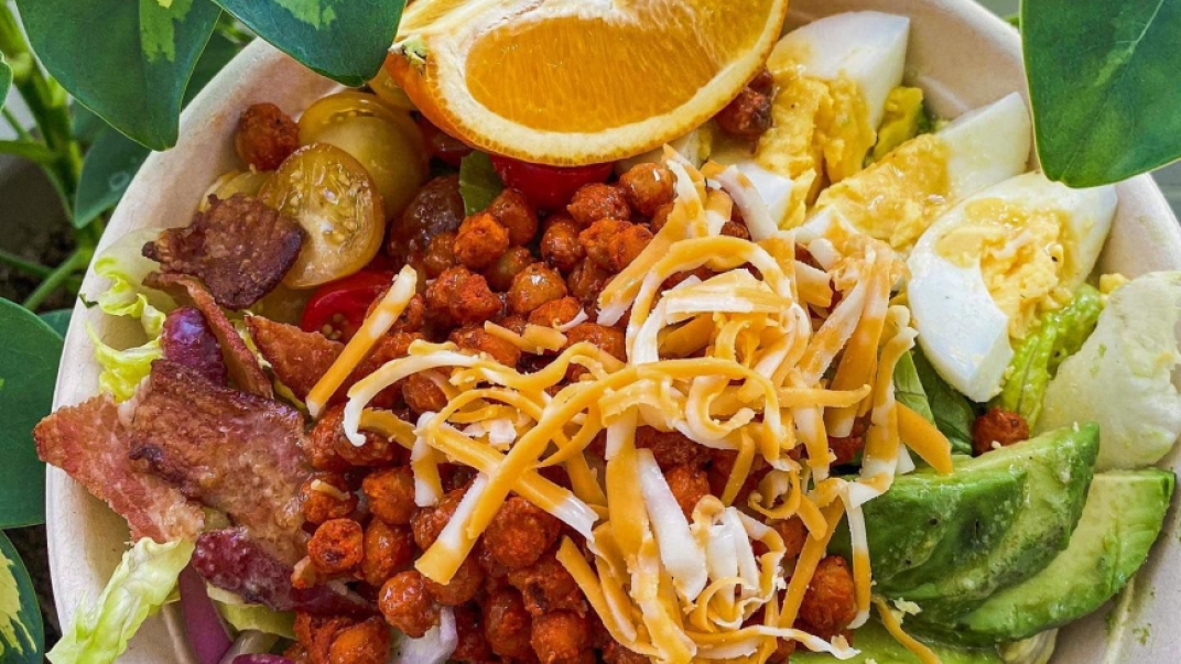 cobb salad with bacon, cheese, egg and avocado