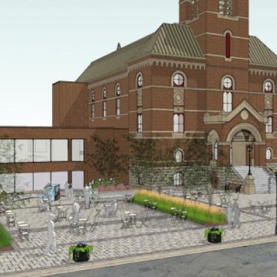 Building with rendering of outdoor eating areas