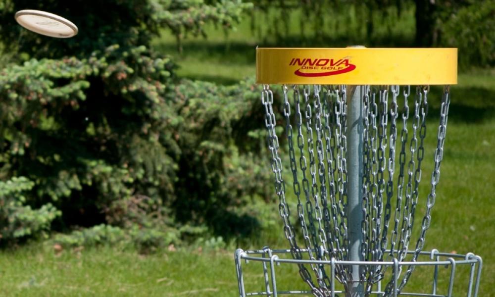 frisbee going into disc golf point