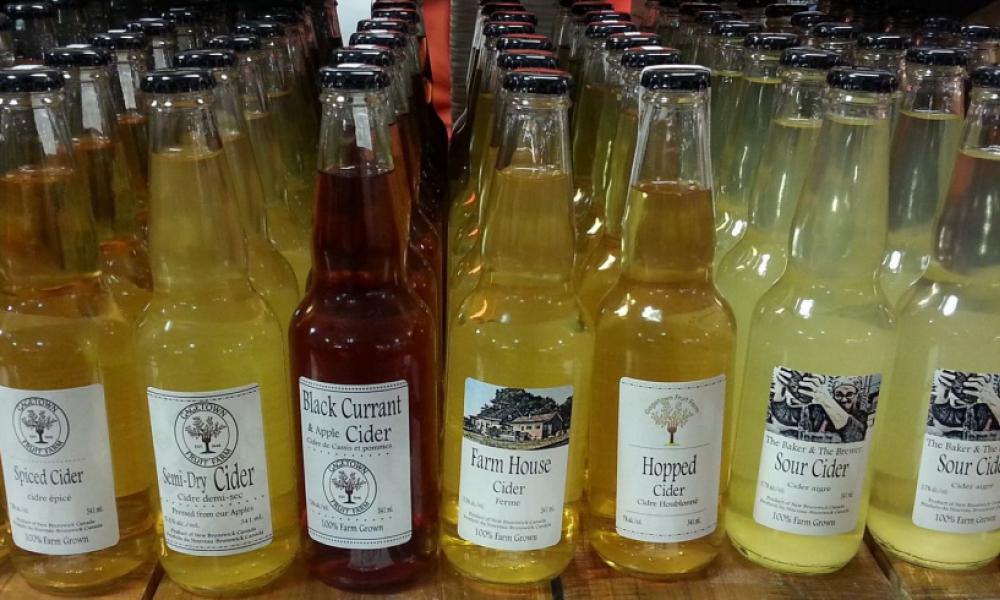 rows of bottled cider of various colours
