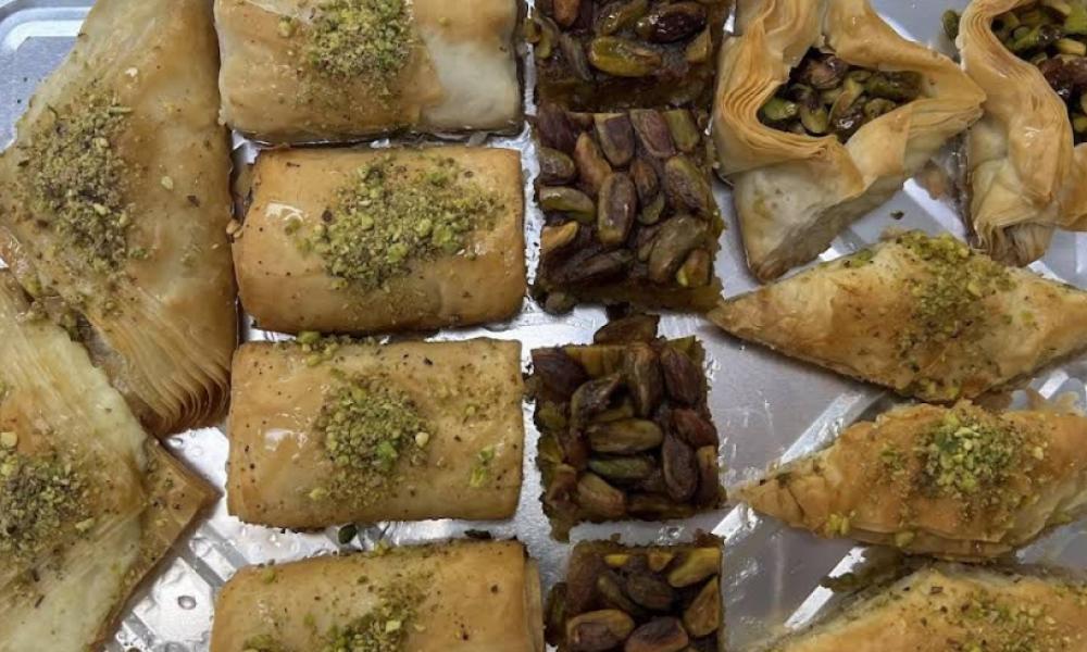 tray of Middle Eastern desserts including baklava 