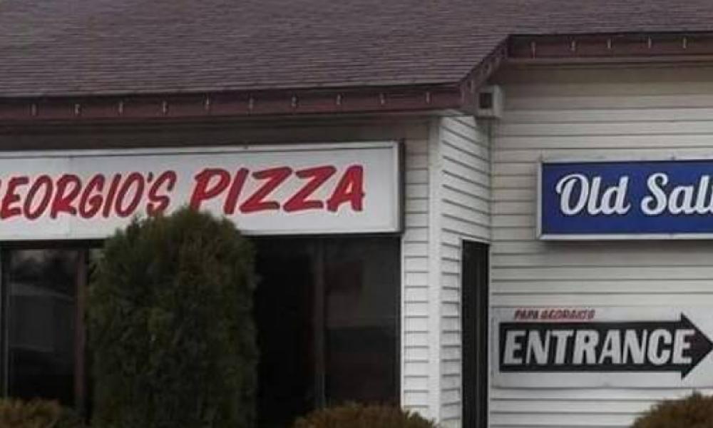 Storefront of Georgios pizza 