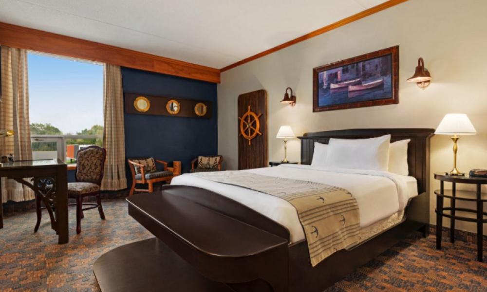 Interior shot of a hotel room with nautical elements throughout. 